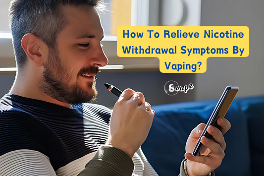 A smiling man sitting on a couch, holding a vape pen in one hand and a smartphone in the other, with the text “How To Relieve Nicotine Withdrawal Symptoms By Vaping?